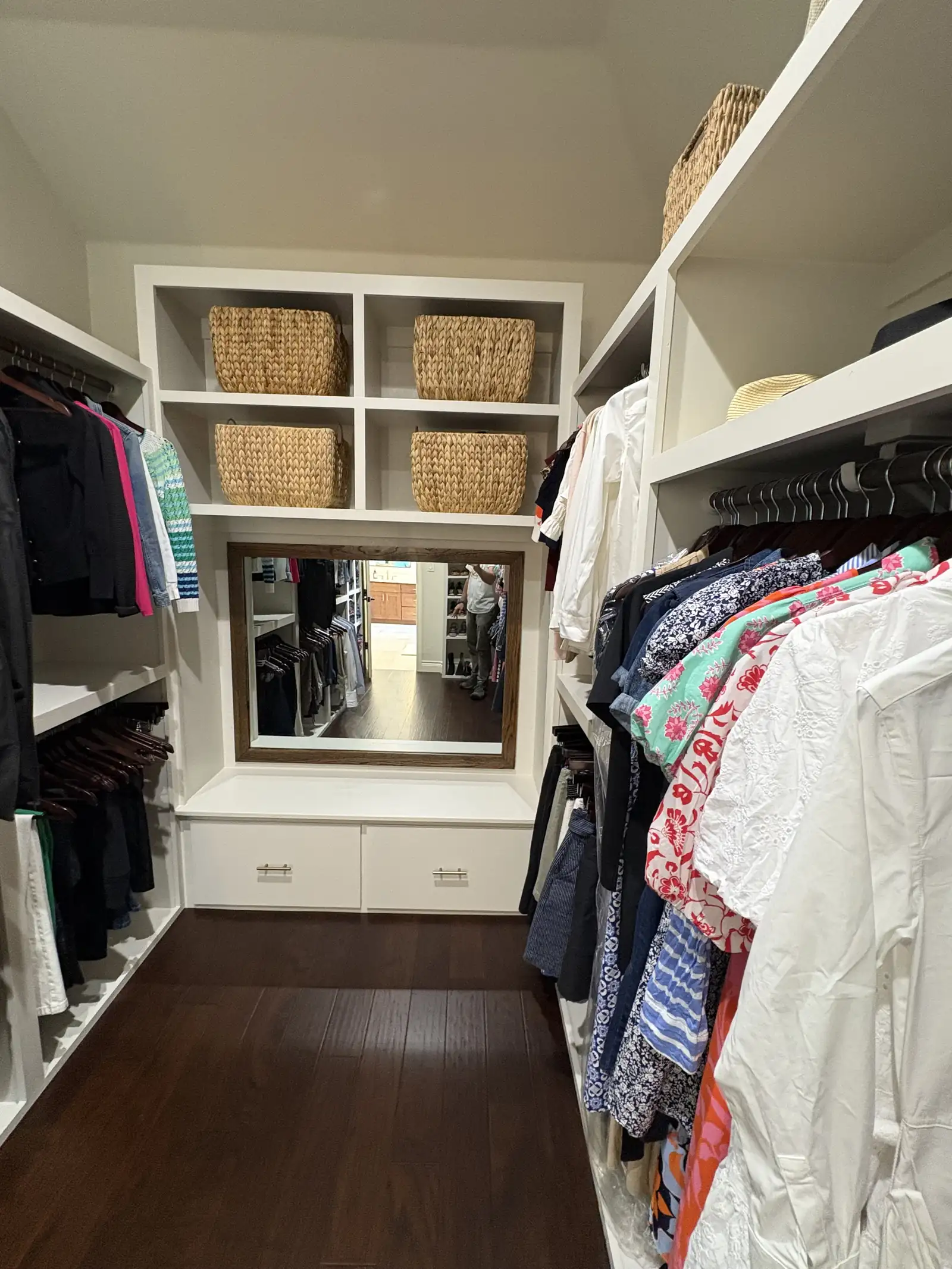 Custom closet with drawers, hanging and shelving fully loaded