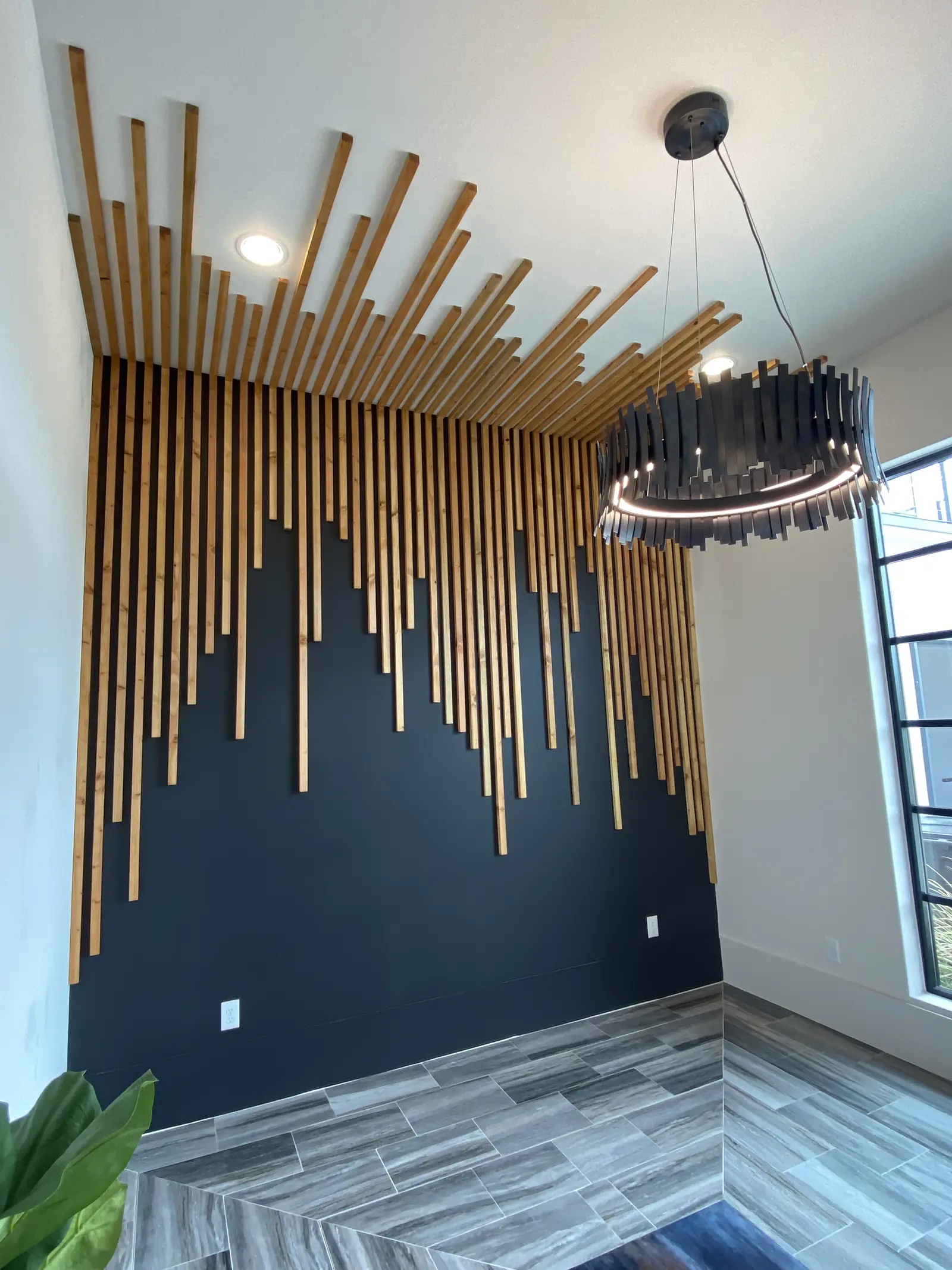 Geometric wood batten feature wall with vertical dowels